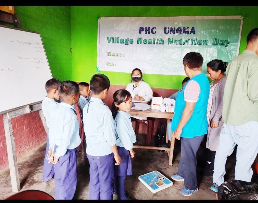 Village Health Nutrition Day (VNHD) was observed at Government Primary School, Ungma Old with Dr Moamongla as the Medical Officer at Ungma village, Mokokchung on October 14. Two ANM staffs, Anganwadi workers and Malaria surveillance were also present to assist the medical camp. As a part of the outreach activity, the health component was provided by Medical Department and the nutrition component was provided by Social Welfare Department. At the medical camp, health education and awareness talk were given by Dr Moamongla. Immunization for kids, free doctor consultation and free medical checkup with free medicines were given along with sweets to the students. During many of the VHND observations other activities like pregnant lady check up, community screening of elderly for htn n dmt2, malaria surveillance by taking blood slide, distribution of Oral Contraceptive Pill and condoms to eligible couples takes place. (Photo Courtesy: PHC Ungma)